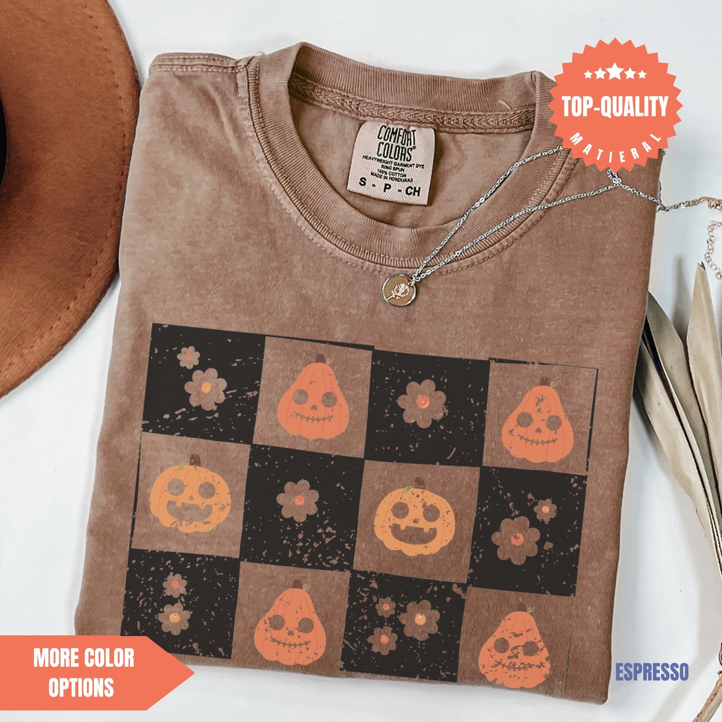 a t - shirt with a picture of pumpkins on it