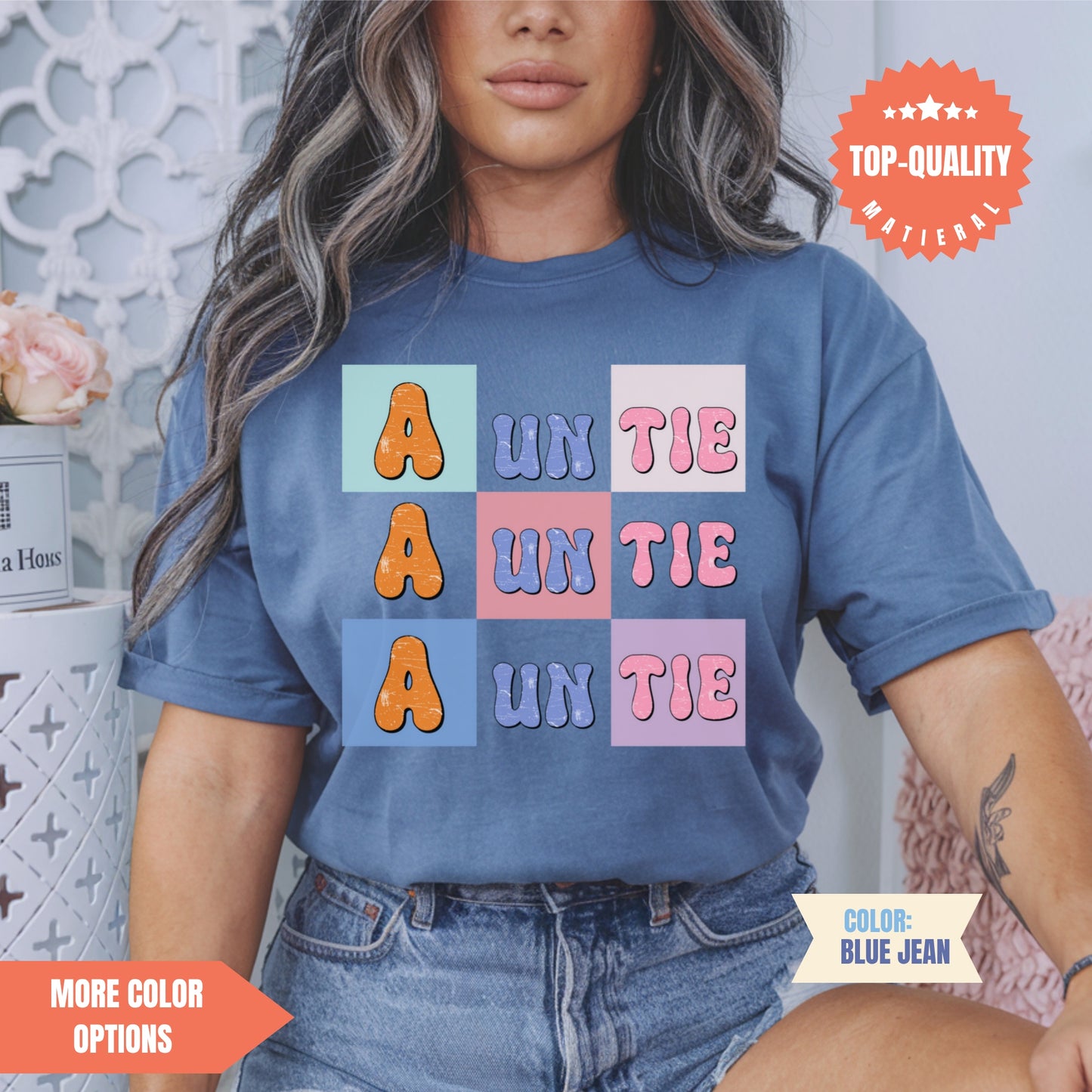 a woman wearing a t - shirt that says un the a in the untie