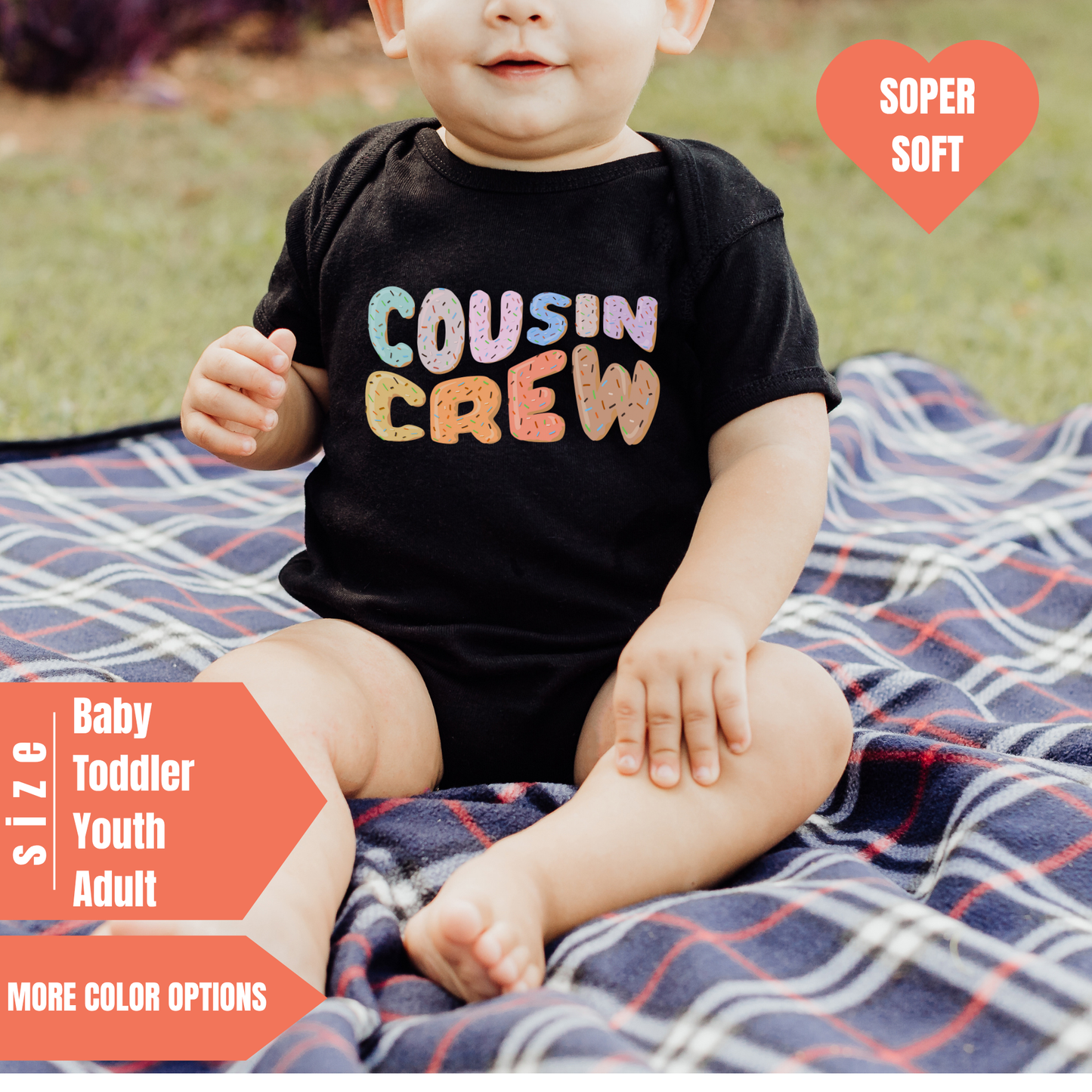 a baby sitting on a blanket on the ground