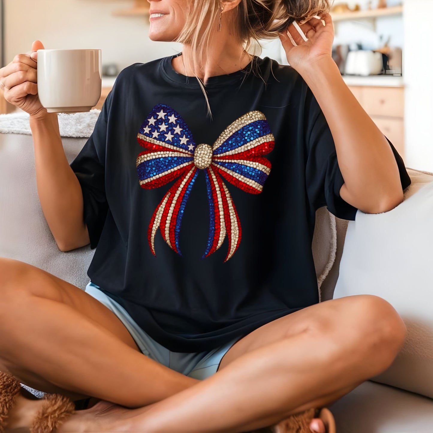 a woman sitting on a couch holding a cup of coffee