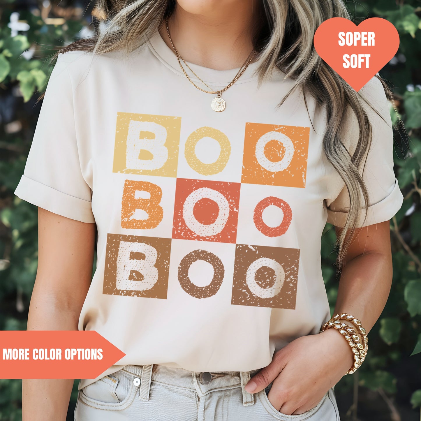 a woman wearing a t - shirt that says boo boo boo