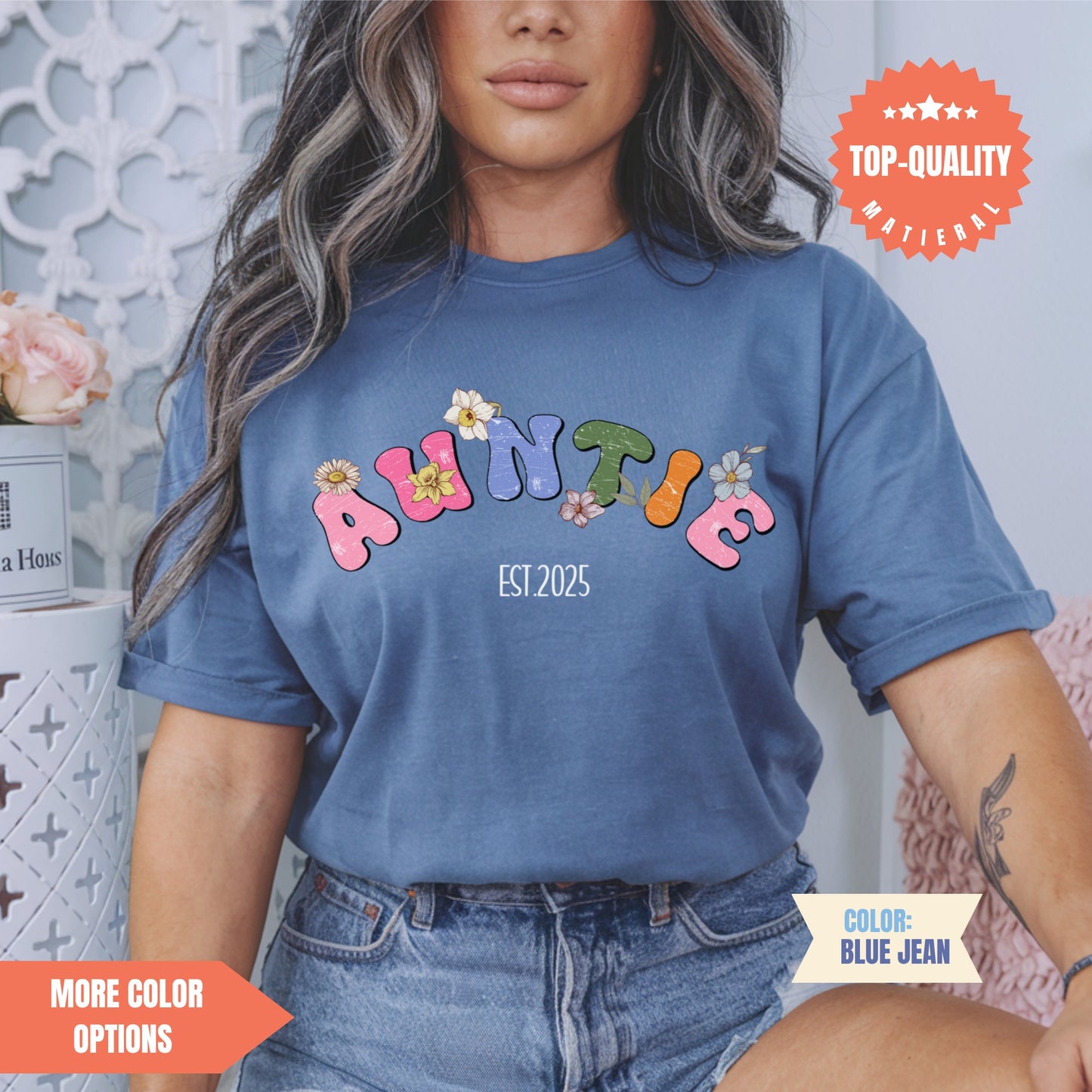 a woman wearing a blue shirt with the word bunny on it