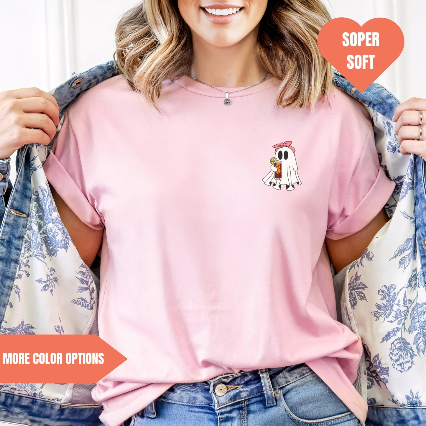a woman wearing a pink shirt with a dog on it