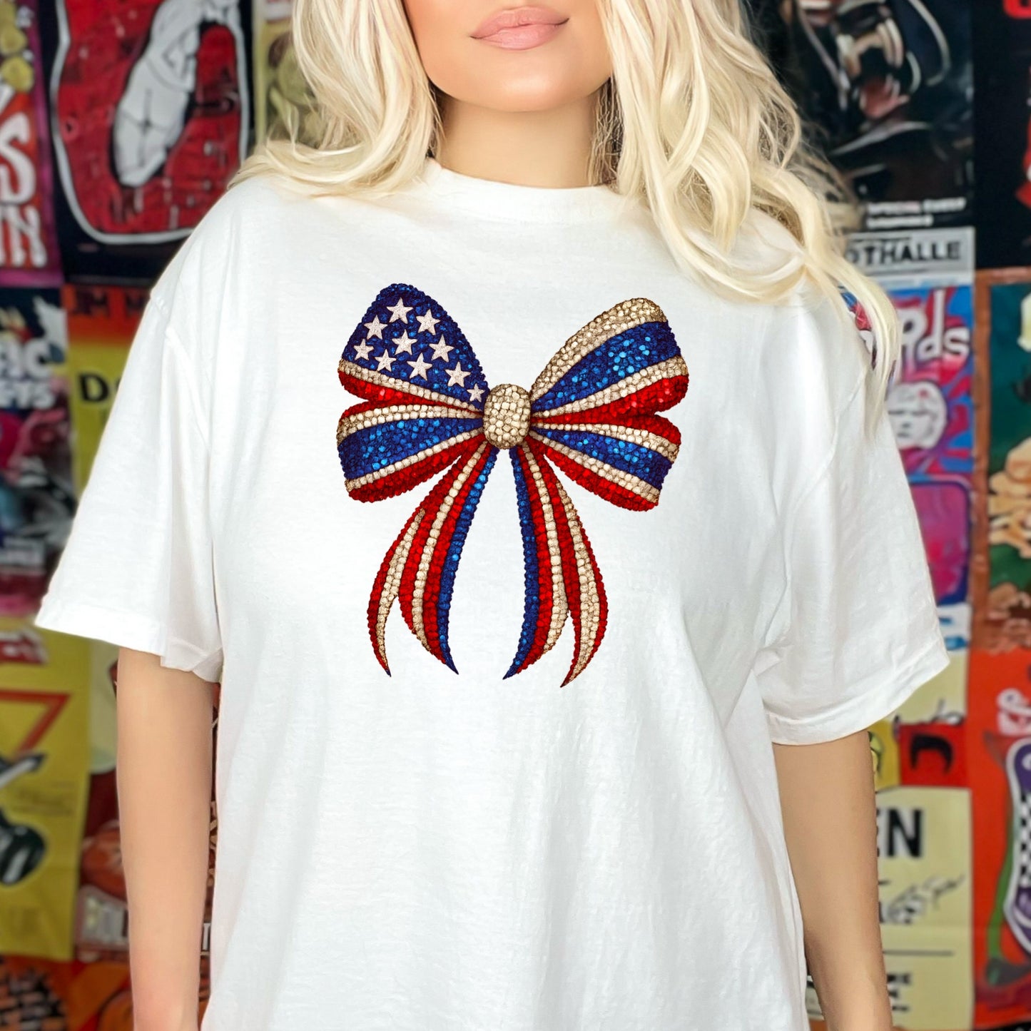 a blonde woman wearing a white shirt with a red, white, and blue bow