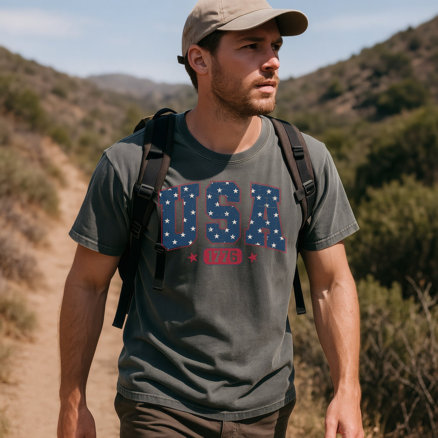 a man with a backpack walking down a dirt road