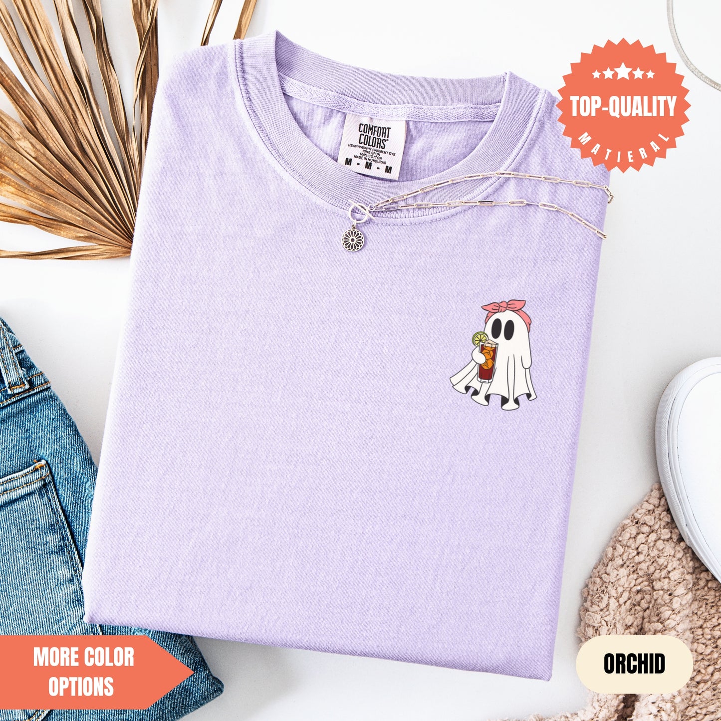 a purple shirt with a ghost on it