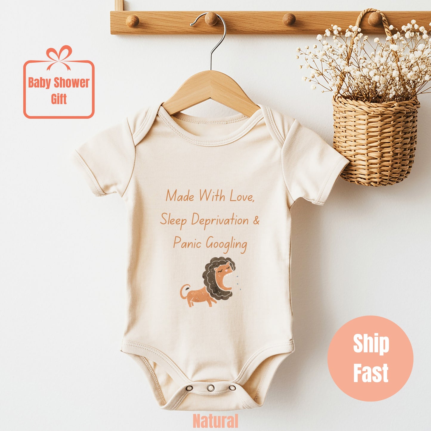 a baby bodysuit with a picture of a lion on it