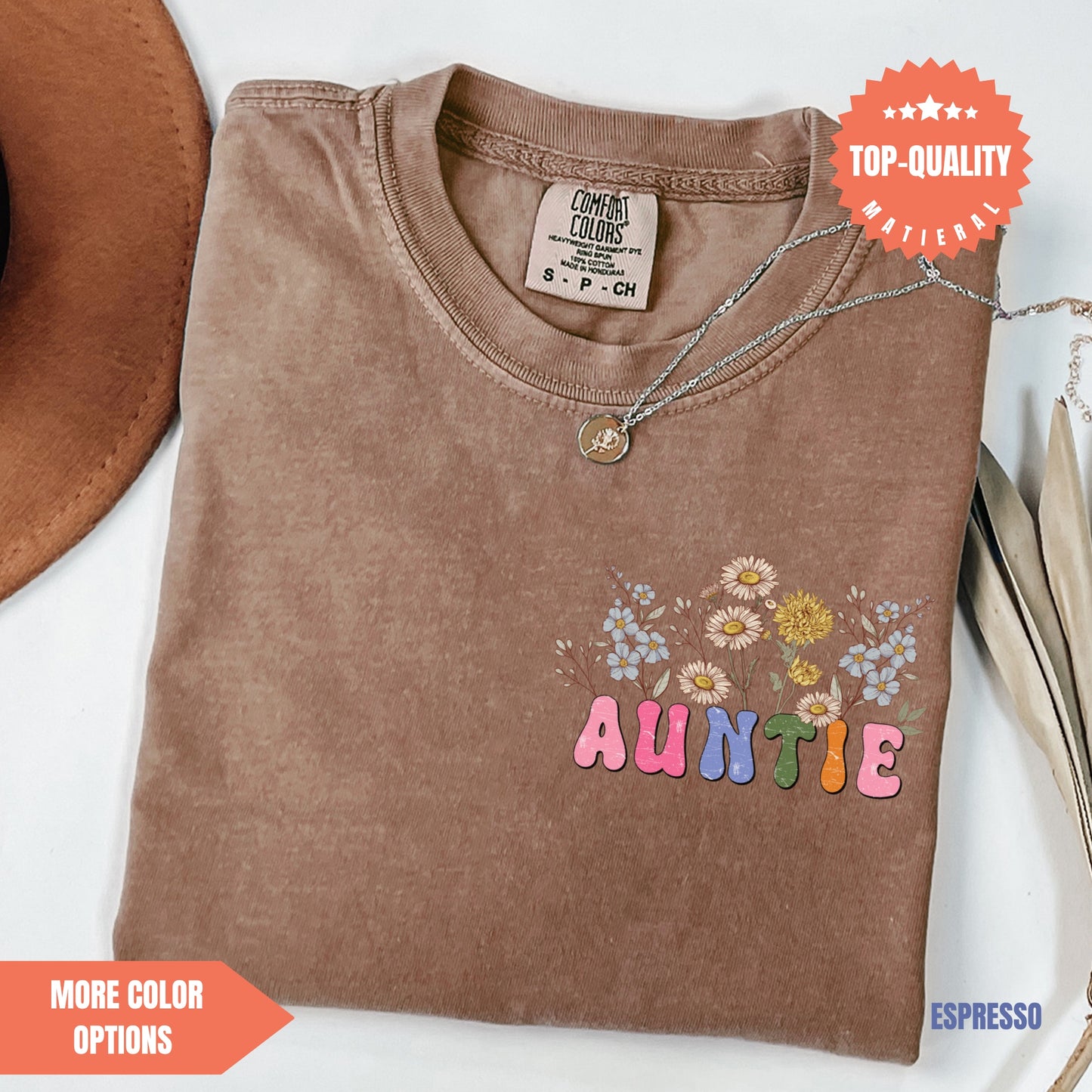 a brown t - shirt with the word annie embroidered on it