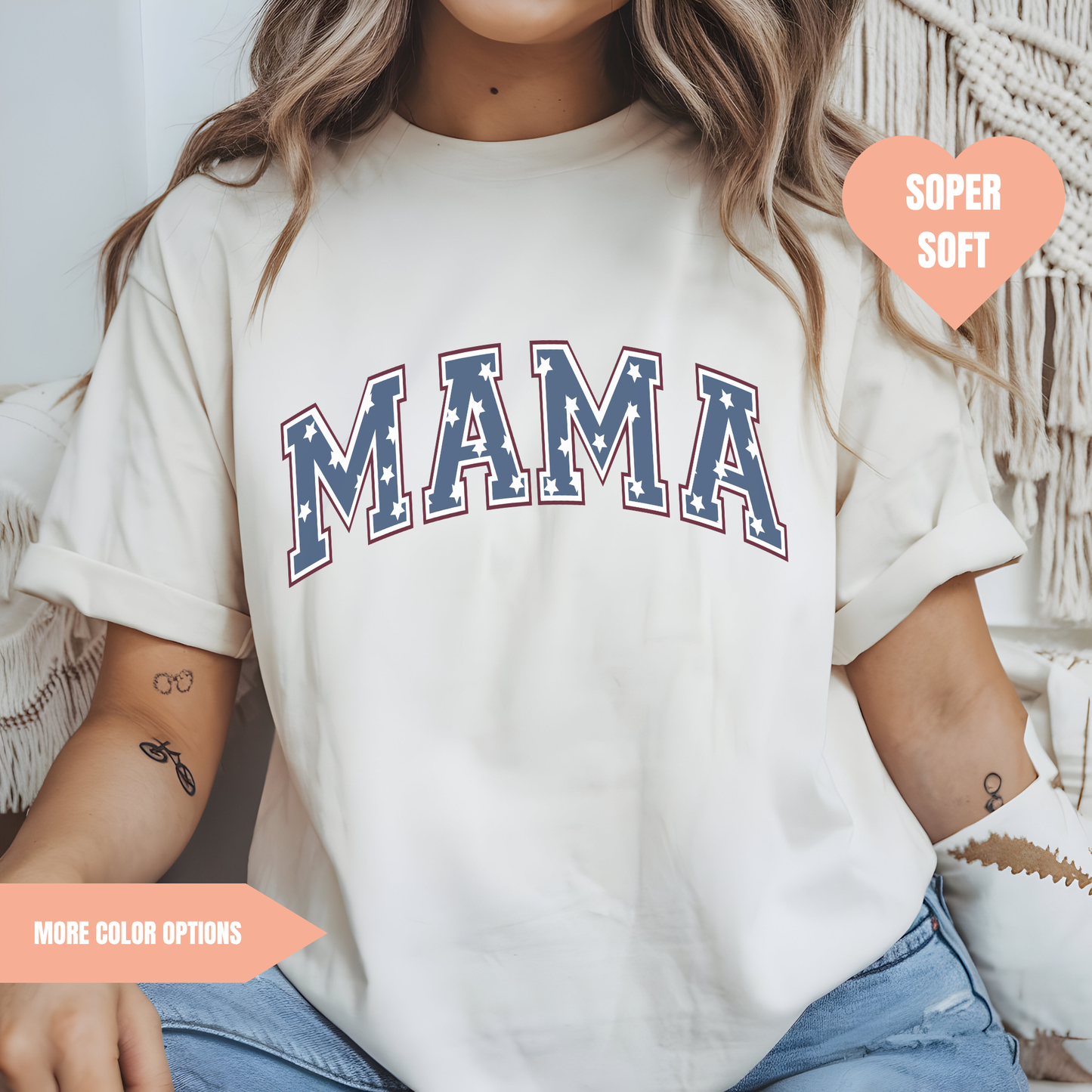 a woman wearing a white shirt with the word mama on it