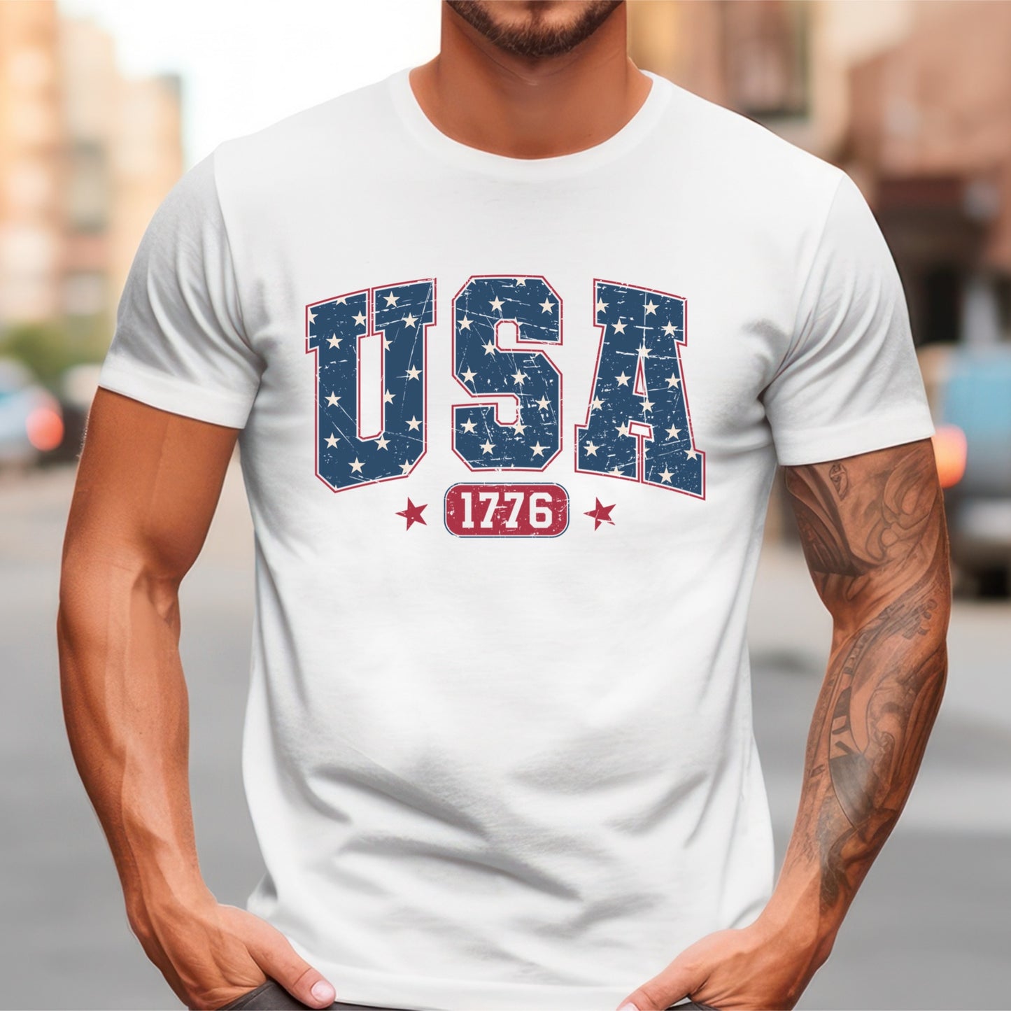 a man wearing a white usa t - shirt with red, white, and blue