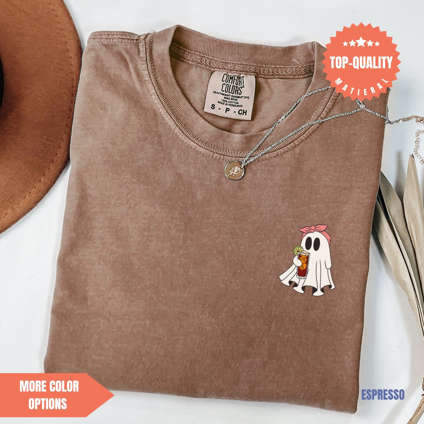a brown t - shirt with a ghost on it