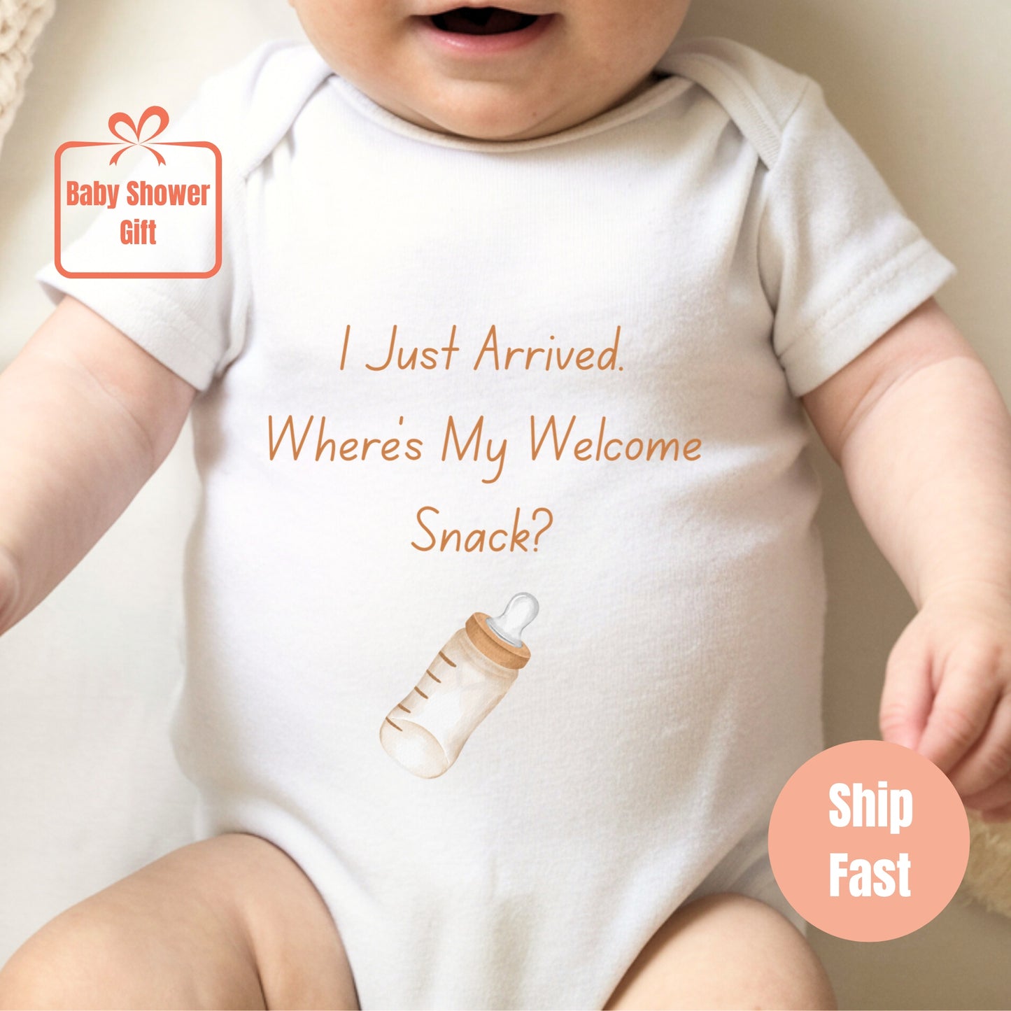a baby wearing a white bodysuit with a message on it