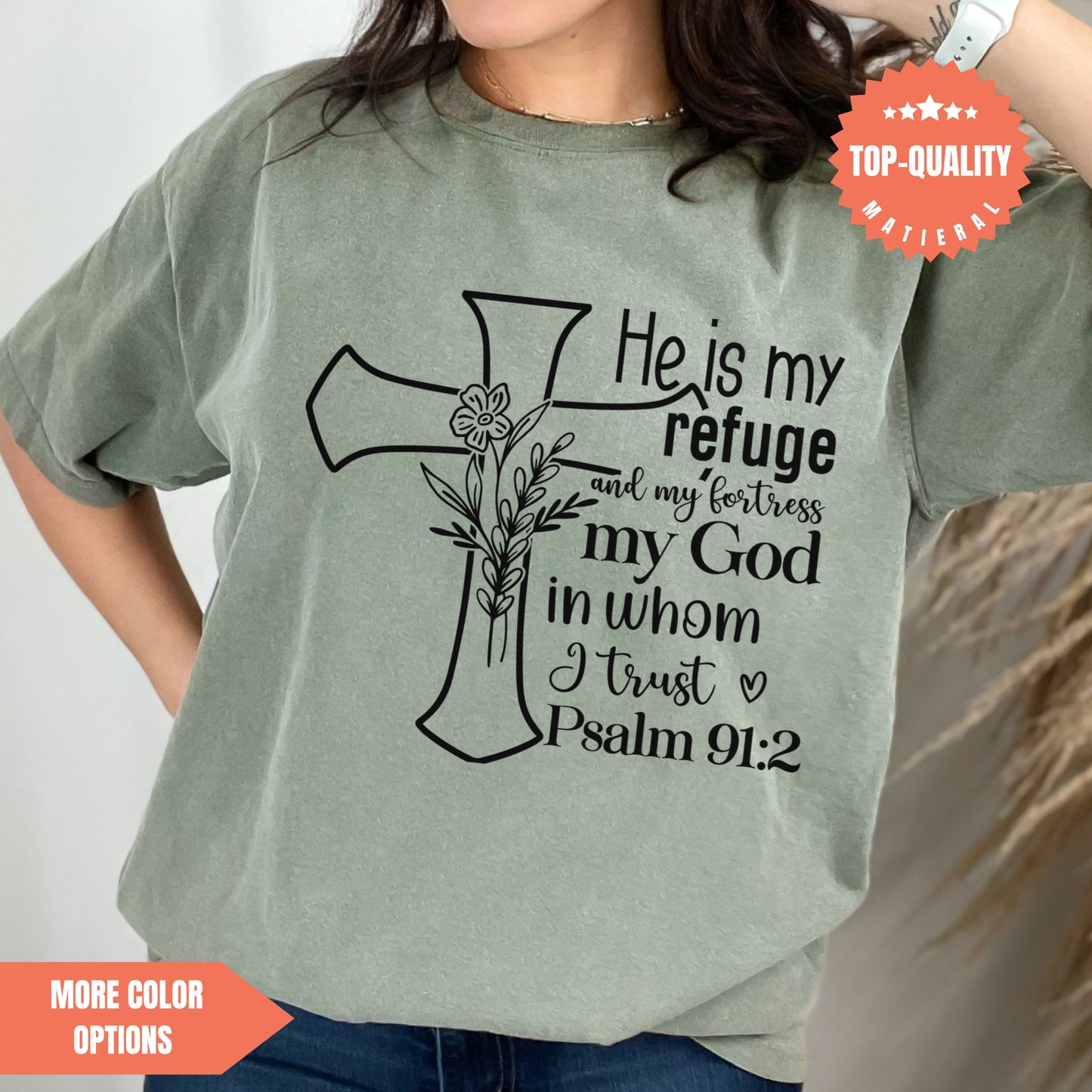 a woman wearing a t - shirt that says he is my refuge and my fortress