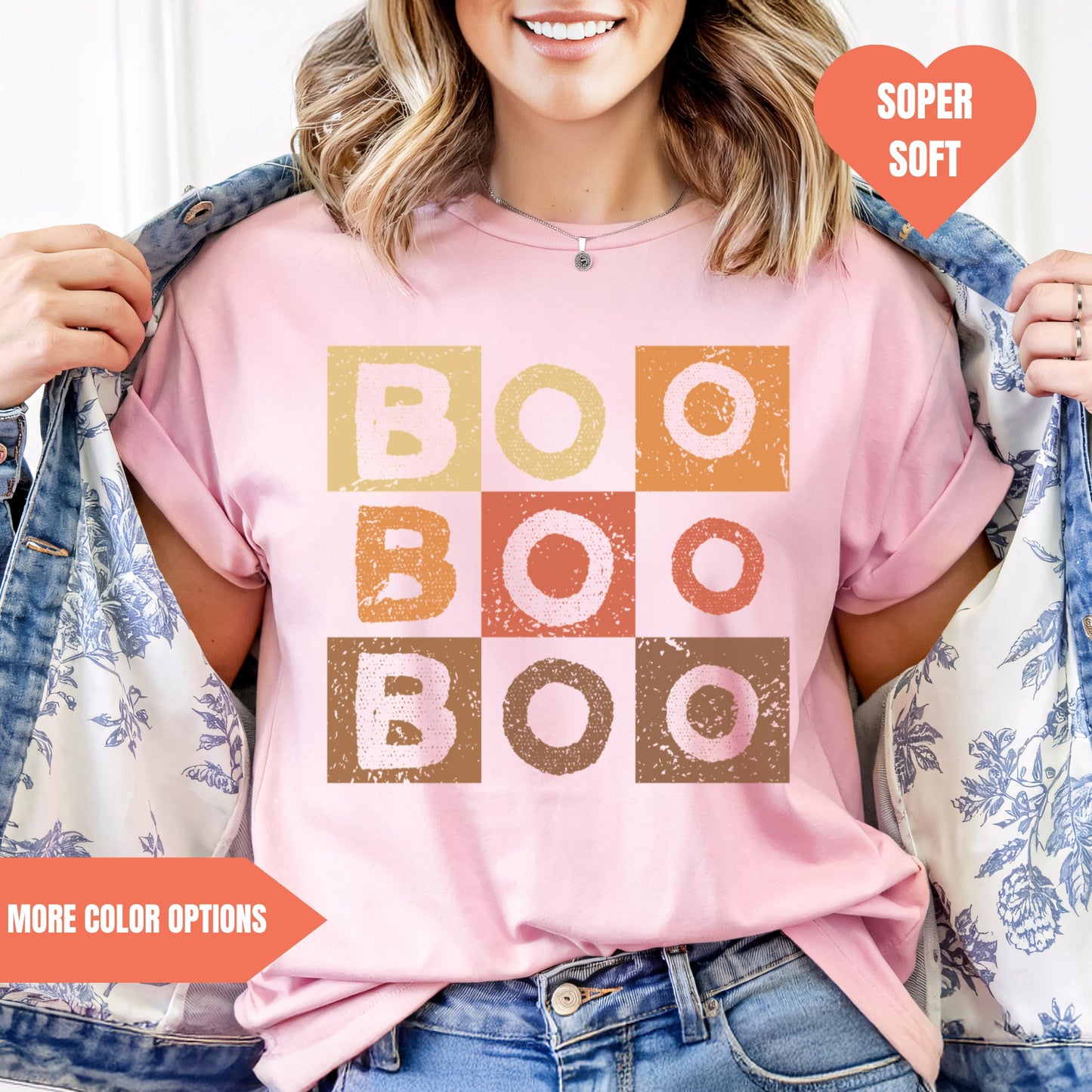 a woman wearing a t - shirt that says boo boo boo