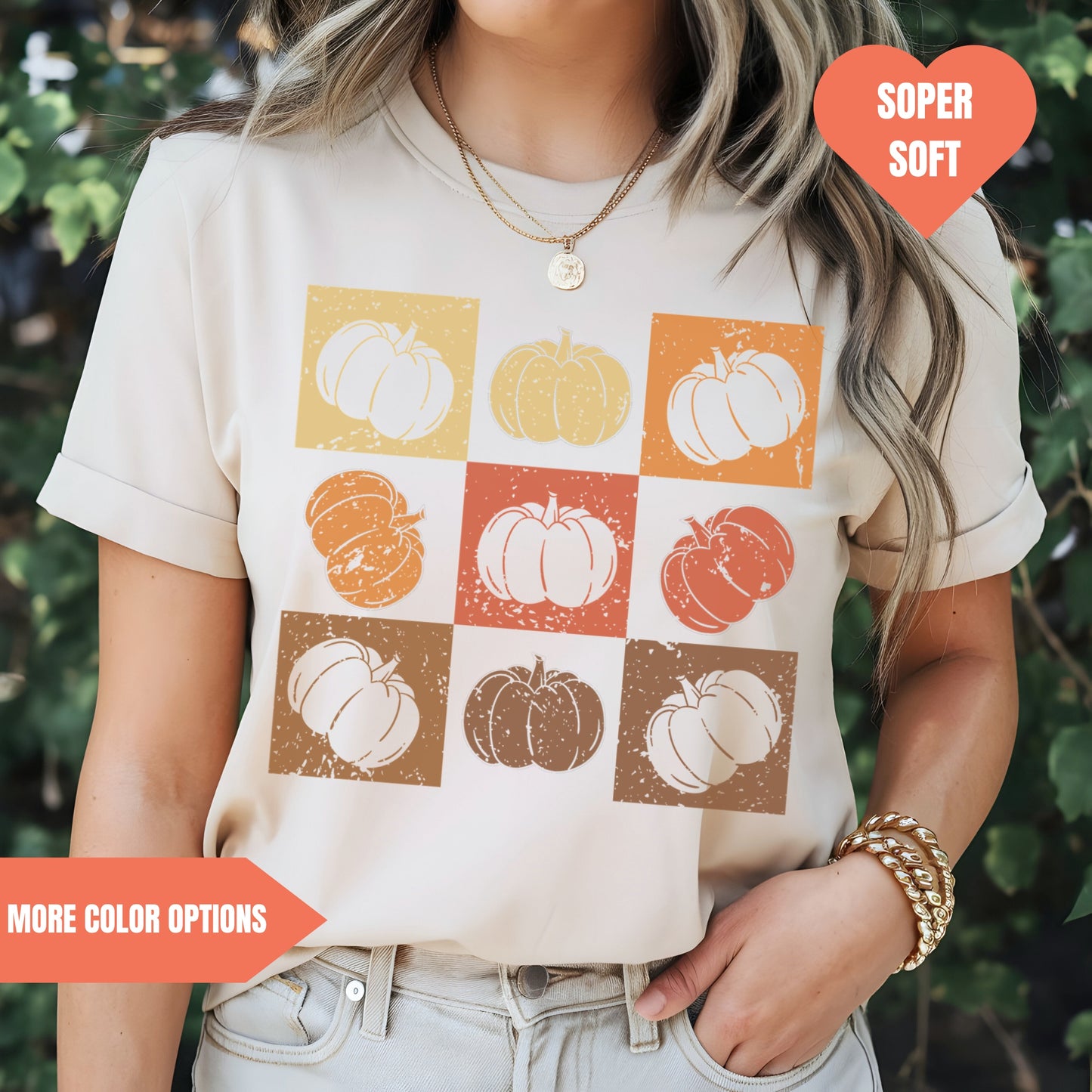 a woman wearing a t - shirt with pumpkins on it