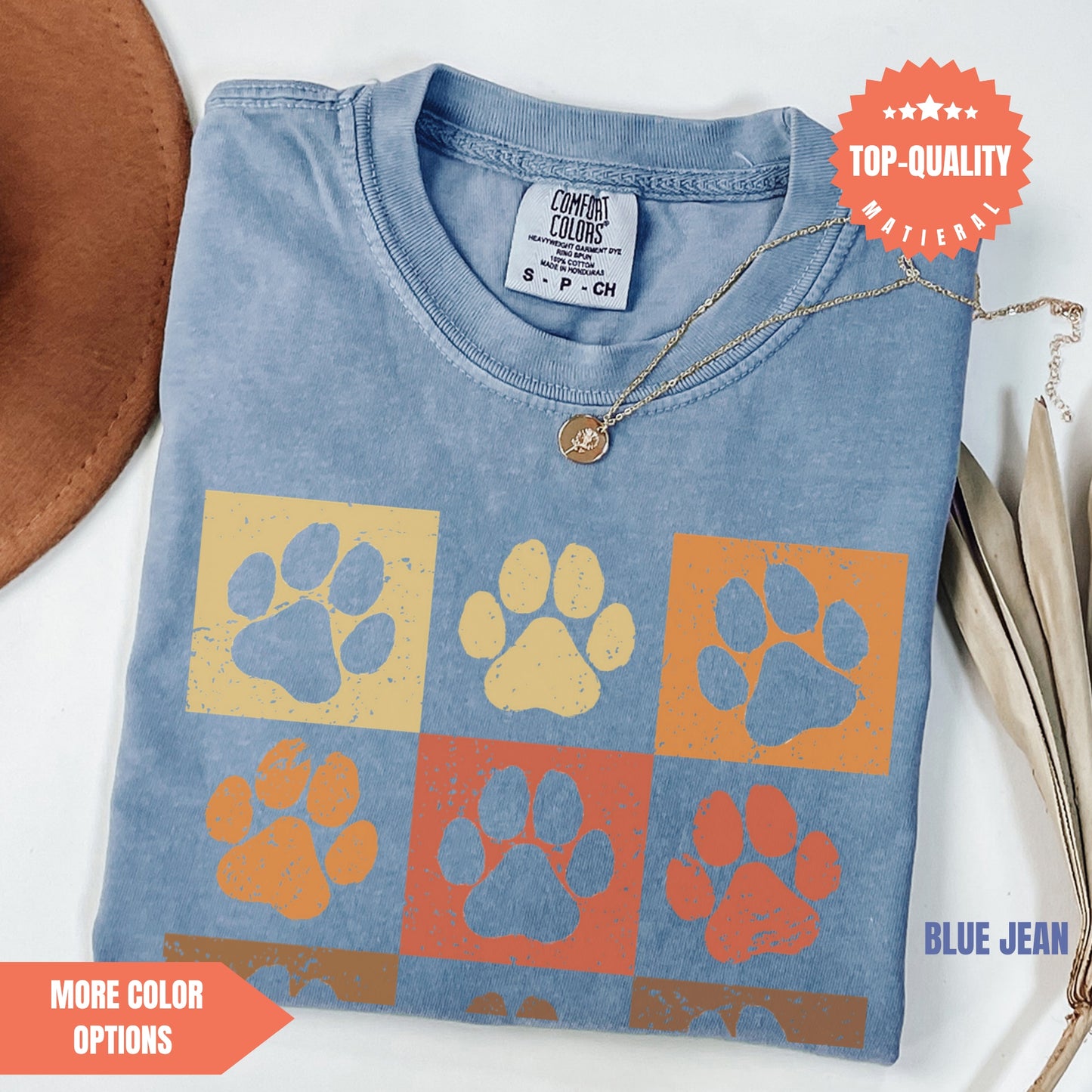 a t - shirt with a dog's paw prints on it