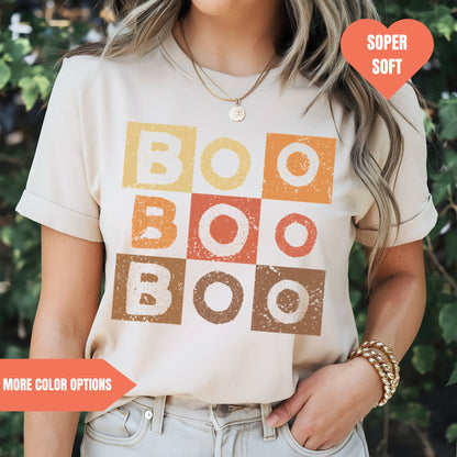 a woman wearing a t - shirt that says boo boo boo