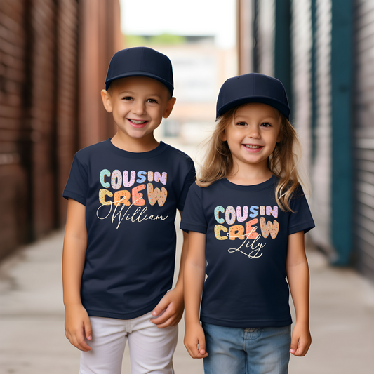 two little girls wearing matching shirts and hats
