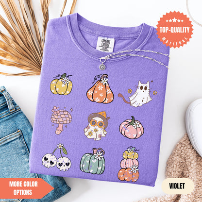 a purple shirt with a bunch of pumpkins on it
