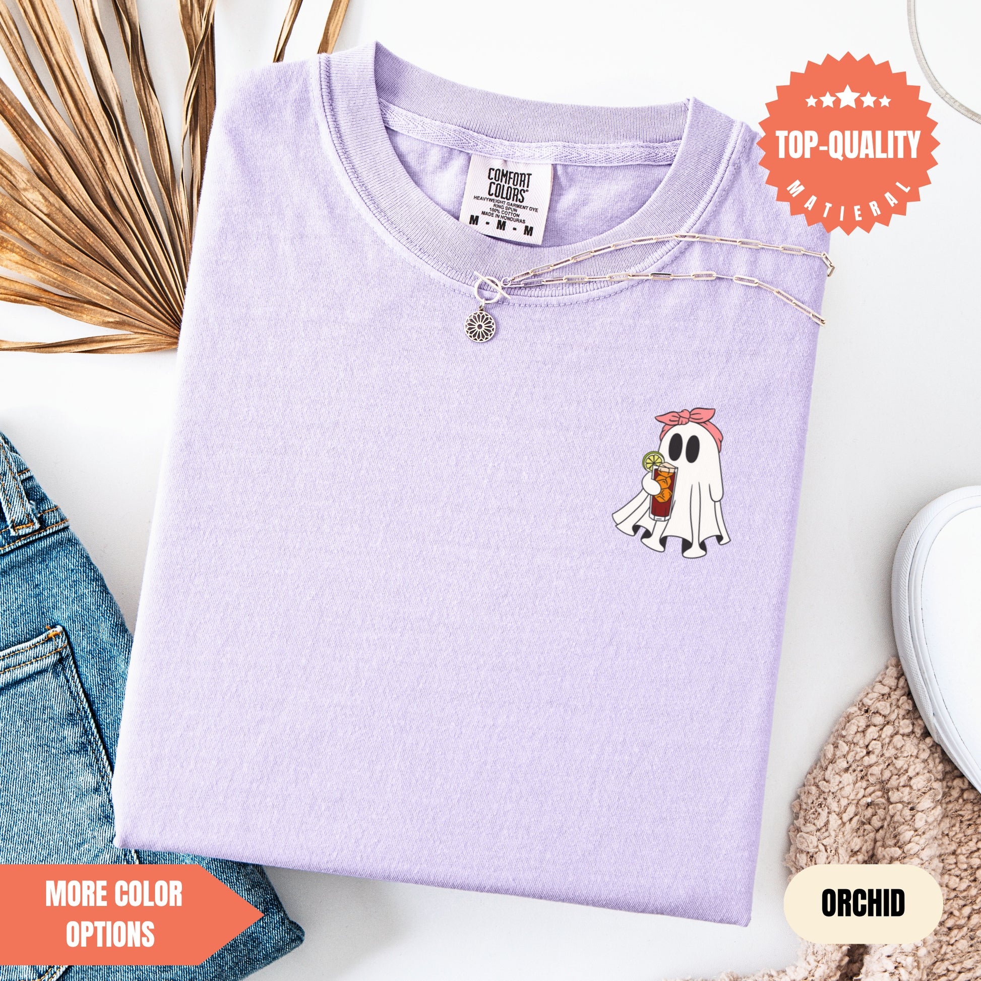 a purple shirt with a ghost on it