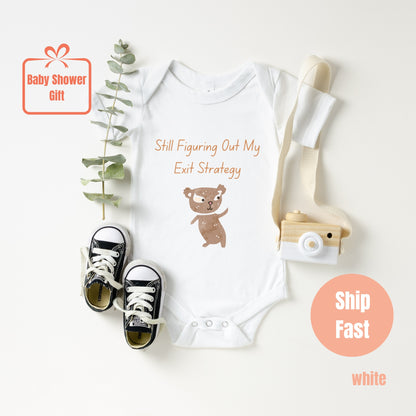 a baby bodysuit with a teddy bear on it