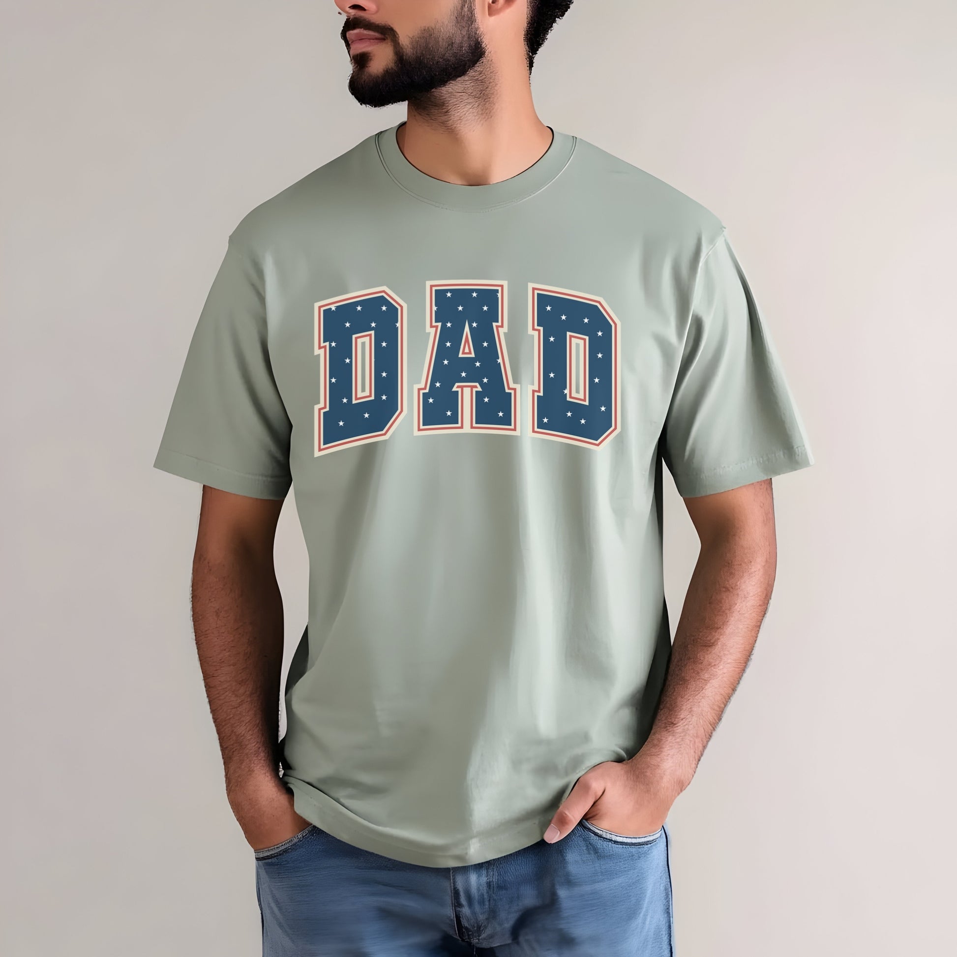 a man wearing a t - shirt with the word dad on it