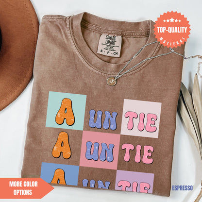 a brown t - shirt with letters and letters on it