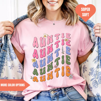 a woman wearing a pink t - shirt with the words,'a little,