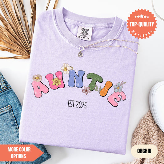 a t - shirt with the name annie on it next to a pair of jeans