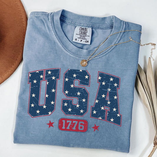 a t - shirt that says usa with stars on it